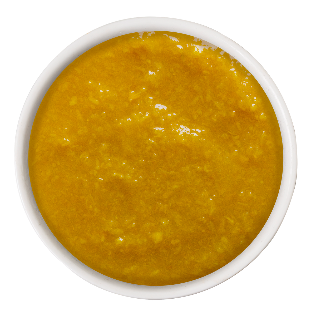 A small bowl filled with Weruva Pumpkin with Ginger & Turmeric Supplement, an orange pumpkin puree for digestive support.