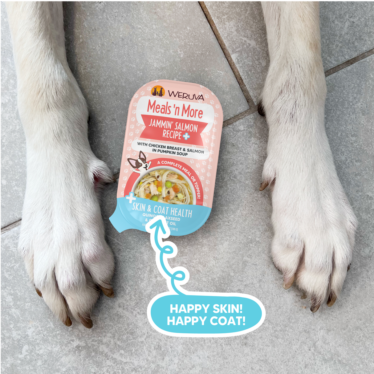 A close-up of a dog’s paws next to a Weruva Jammin' Salmon Recipe Plus dog food packet, featuring wild-caught salmon for skin health. A label with an arrow says HAPPY SKIN! HAPPY COAT! on a light background.