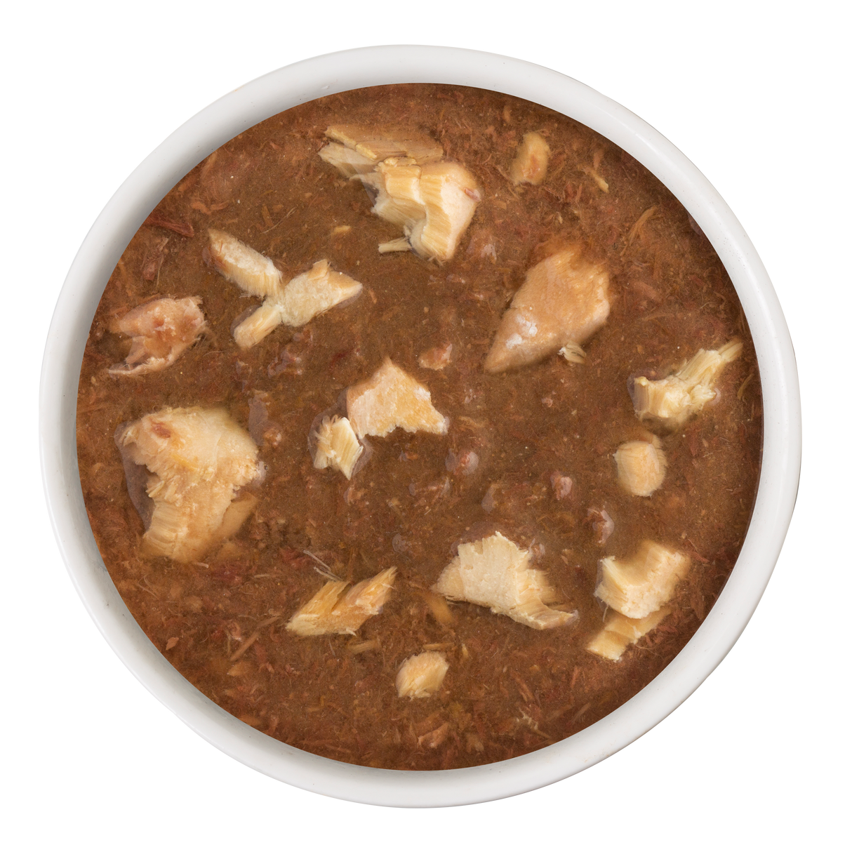A white bowl filled with Soulistic Tuna & Salmon Dinner in Gravy, featuring chunks of tuna and salmon in a thick, saucy mixture, photographed from above on a white background.
