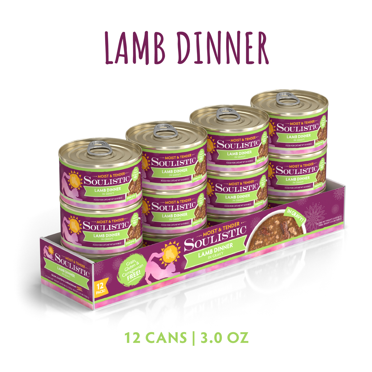 A 12-pack of Soulistic Lamb Dinner in Gravy wet cat food, each 3.0 oz can with deboned lamb for high-quality protein, arranged in two rows on a vibrant purple and green tray with product labels visible.