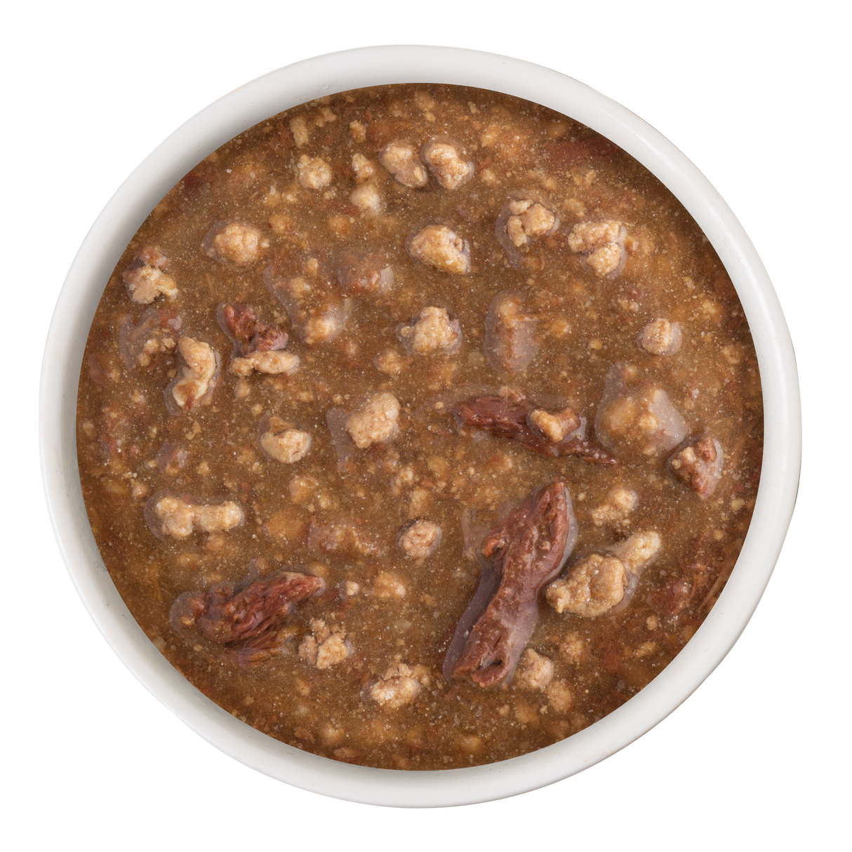 A white bowl of Soulistic Lamb Dinner in Gravy, filled with chunky wet pet food featuring high-quality deboned lamb in brown gravy, viewed from above on a white background.
