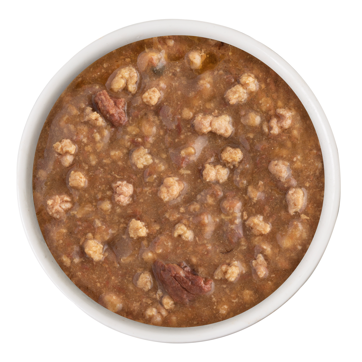 A white bowl filled with Soulistic Turkey Dinner in Gravy showcases chunky wet dog food with visible meat pieces, small textured morsels, and high-quality protein for a nutritious meal.