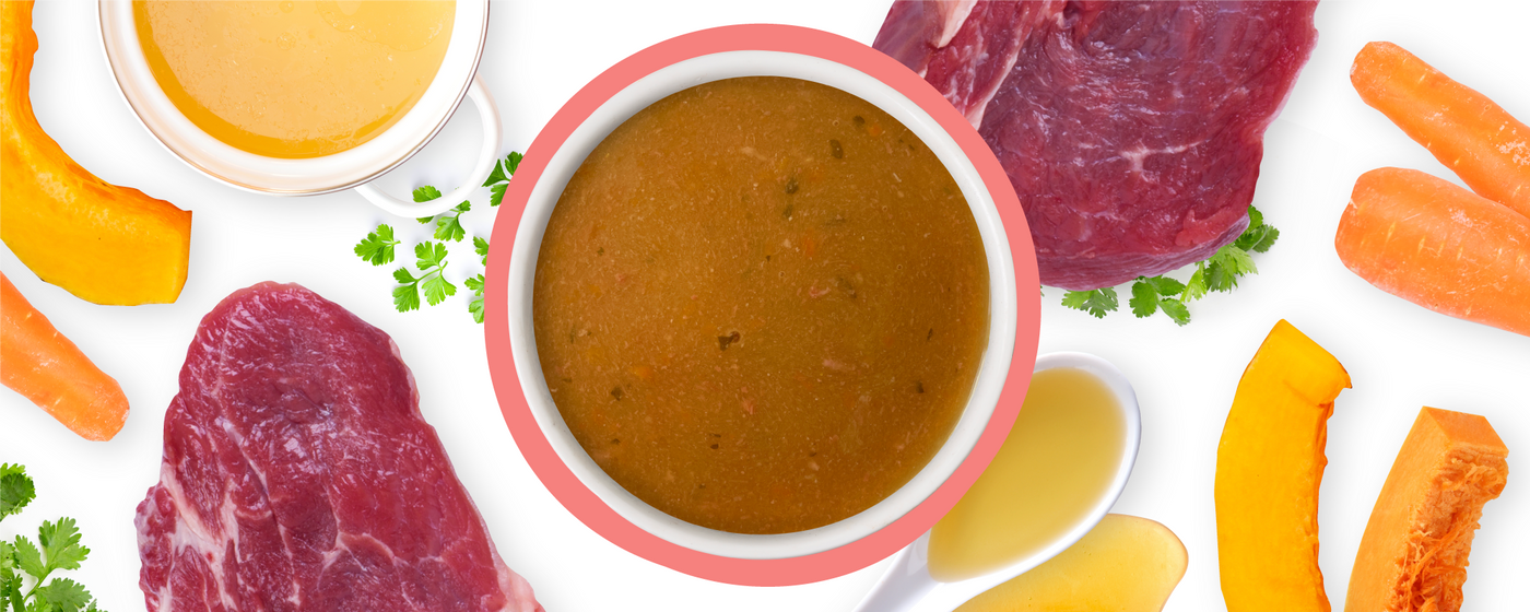 A bowl of brown broth in the center, surrounded by raw beef steaks, carrots, pumpkin slices, parsley, and a cup and spoon of broth, all on a white background.