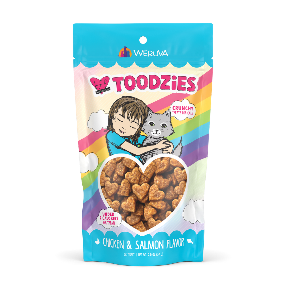 A colorful bag of BFF Best Feline Friend Chicken & Salmon Flavor Crunchy Cat Treats, made in the USA, shows a child hugging a cat and heart-shaped treats visible through a heart-shaped window on the package.