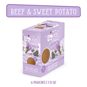 A purple box of Dogs in the Kitchen Beef & Sweet Potato Gravy Meal Topper includes 6 pouches (7.0 oz each) with dogs eating on the packaging—ideal as a tasty dog gravy or meal topper, plus images of the food on display.