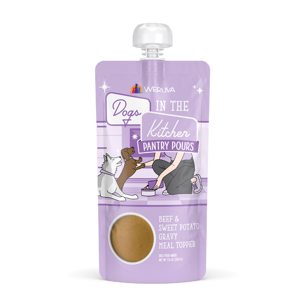 A lavender pouch of Dogs in the Kitchen Beef & Sweet Potato Gravy Meal Topper features two dogs and a person. Made with rich beef bone broth, it includes a clear window displaying the tasty dog gravy inside.