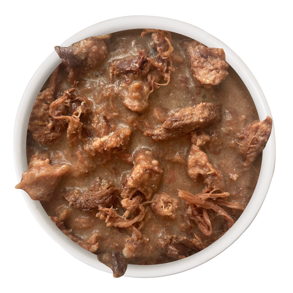 A white bowl filled with Cat Person Beef & Tuna Shreds in Broth, featuring shredded beef and tuna in a savory, moisture-rich broth.