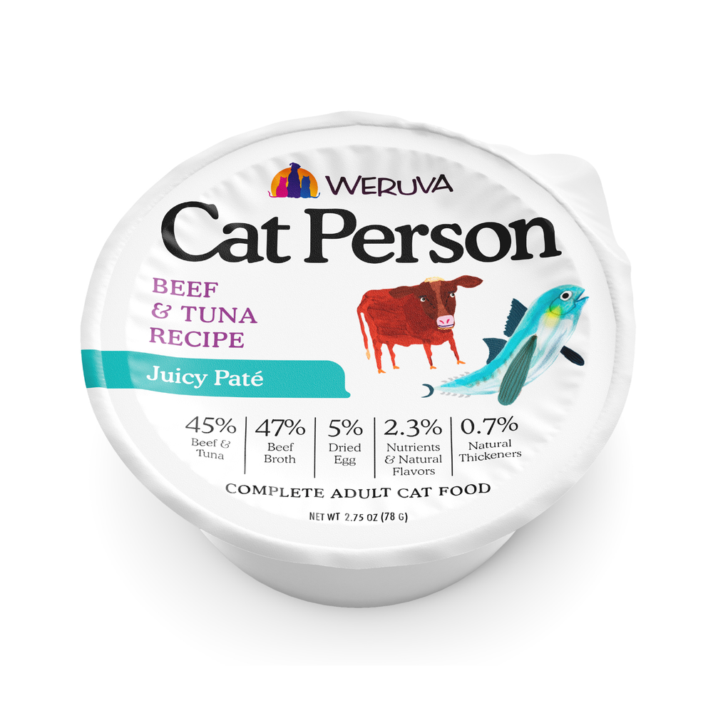 A single-serving cup of Cat Person Beef & Tuna Juicy Paté labeled with an illustration of a cow and a fish, featuring a table showing ingredient percentages for adult cat nutrition.