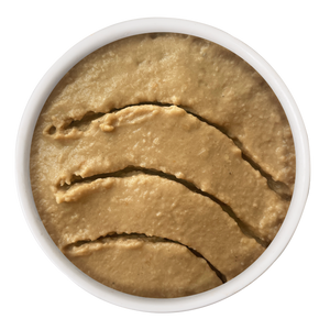 A round container of Cat Person Salmon & Mackerel Juicy Paté, featuring smooth-textured pate with three distinct curved indentations across the surface.