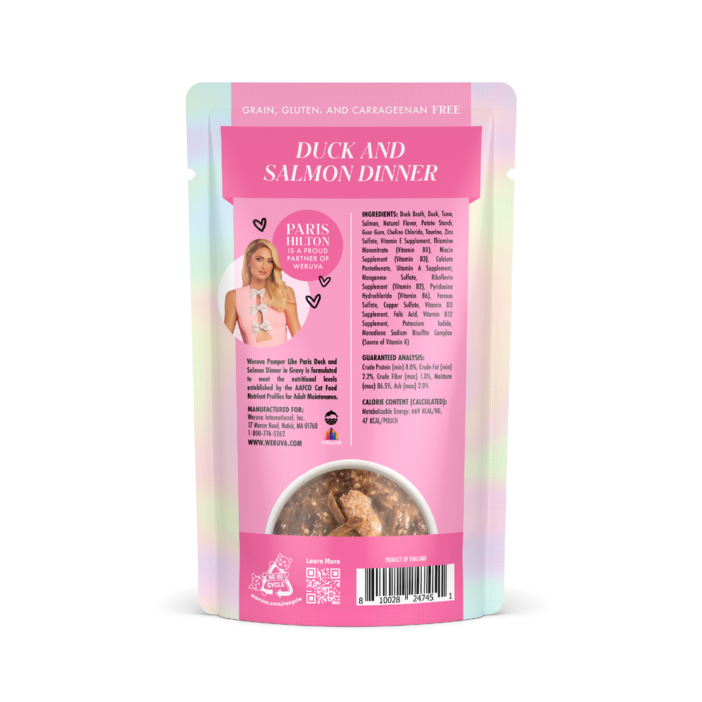 Back view of Weruva Duck and Salmon Dinner in Gravy pet food pouch, showing a blonde woman, cage-free duck and wild-caught salmon ingredients, feeding instructions, barcode, and a window displaying the meal inside.