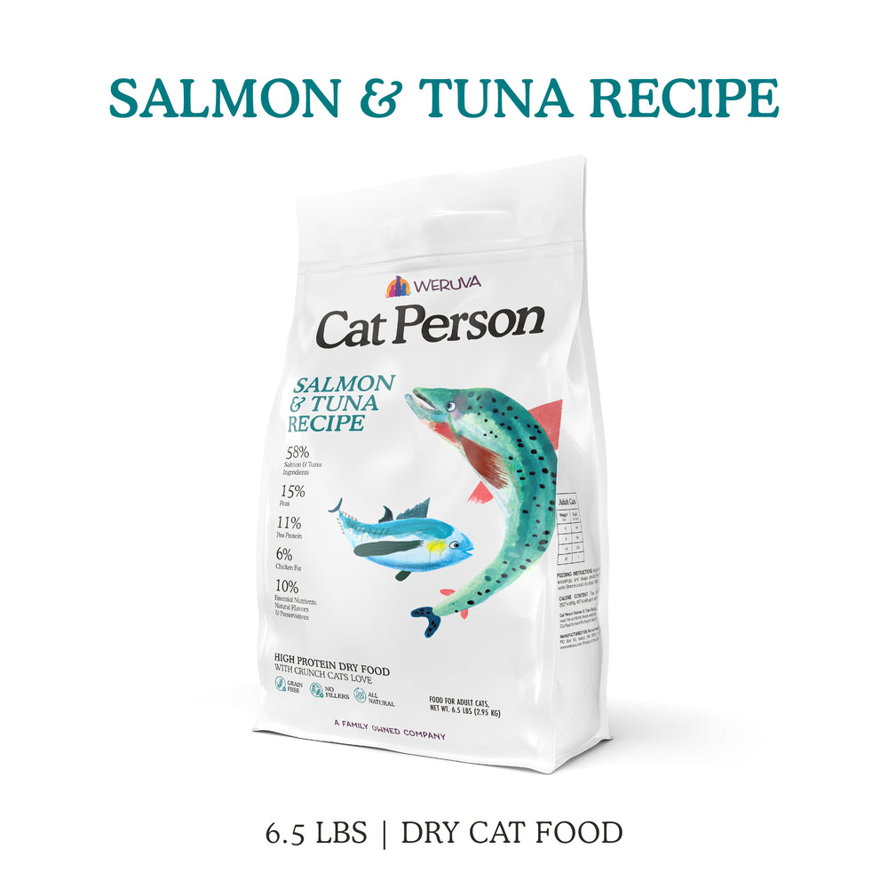 A 6.5 lb white bag of Cat Person Salmon & Tuna Dry Food features salmon and tuna illustrations and nutritional info—an ideal high-protein, grain-free option for your cat.