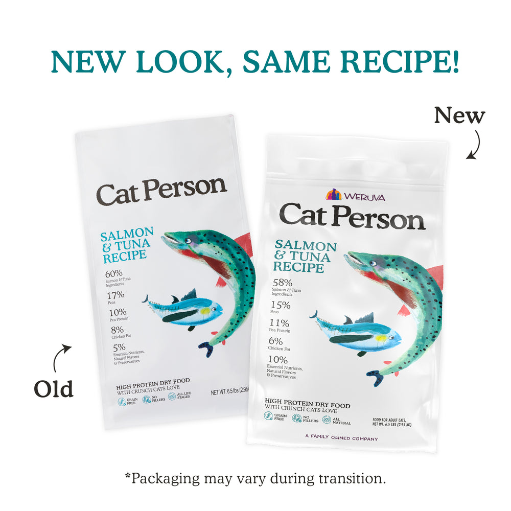 Two bags of Cat Person Salmon & Tuna Dry Food are shown side by side—the old package is on the left, the new on the right. Text reads: “NEW LOOK, SAME RECIPE!” and “Packaging may vary during transition.”.