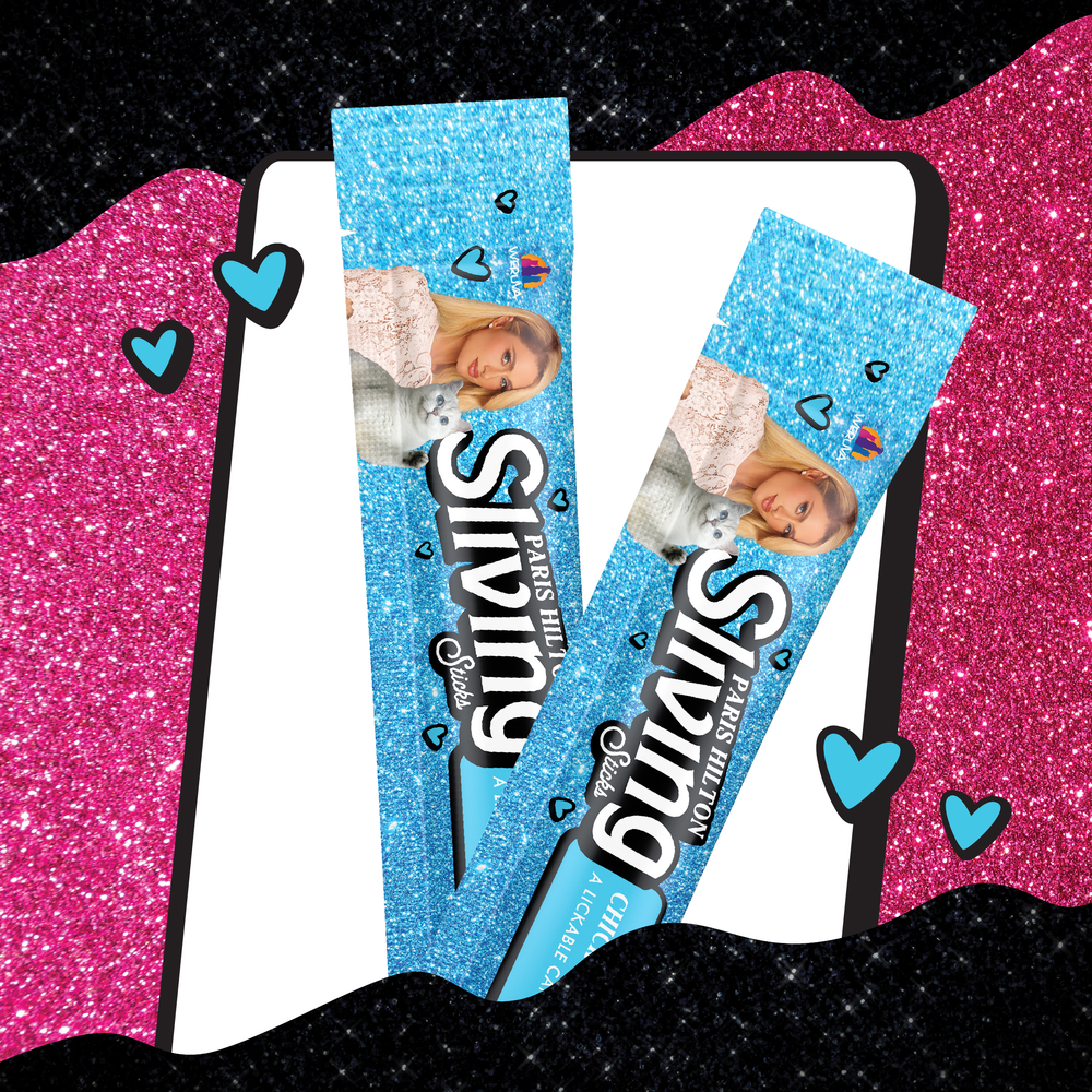 Two blue glittery Weruva Lickable Chicken Cat Treat sticks, each with a woman's photo, hearts, and stars on the wrappers, are set diagonally over a white rectangle. The black and pink glitter background with blue hearts adds elegance.