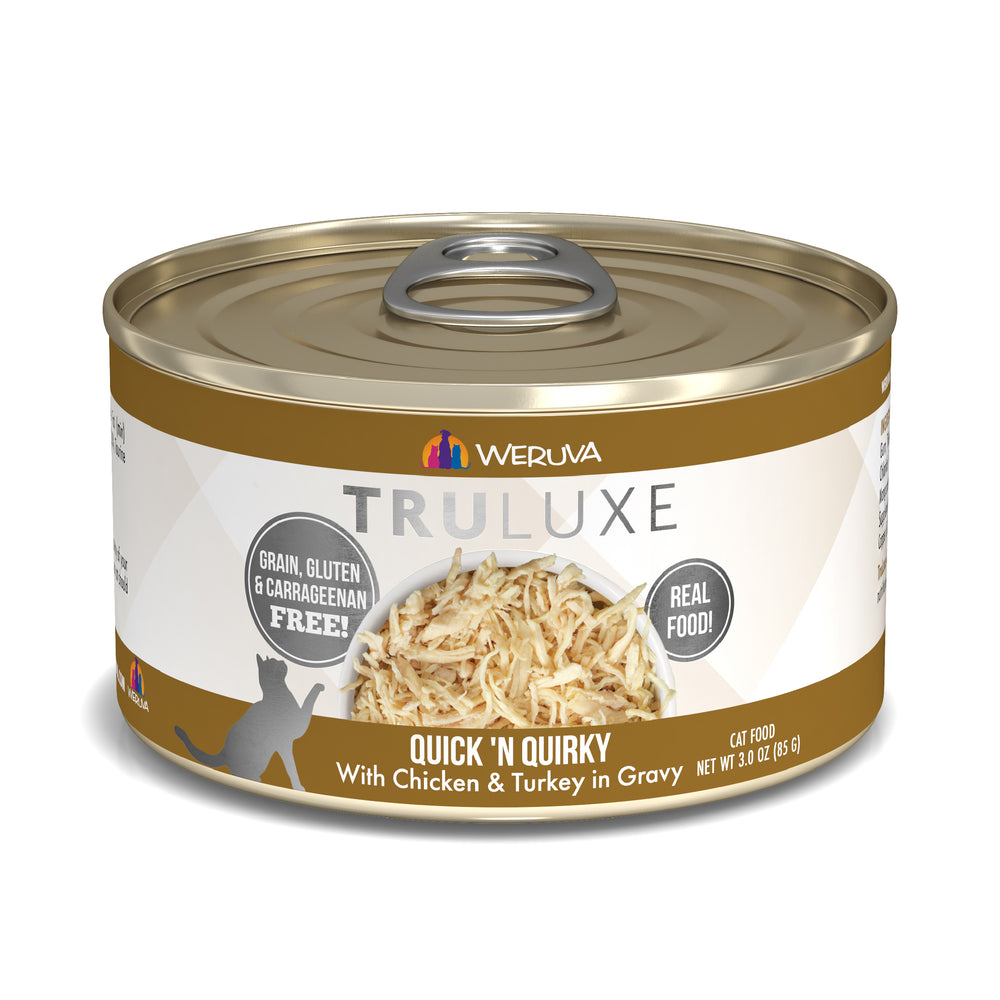 A can of TruLuxe Quick 'N Quirky cat food contains shredded boneless chicken and cage-free turkey in gravy. The label states "Grain, Gluten & Carrageenan Free" and "Real Food!".