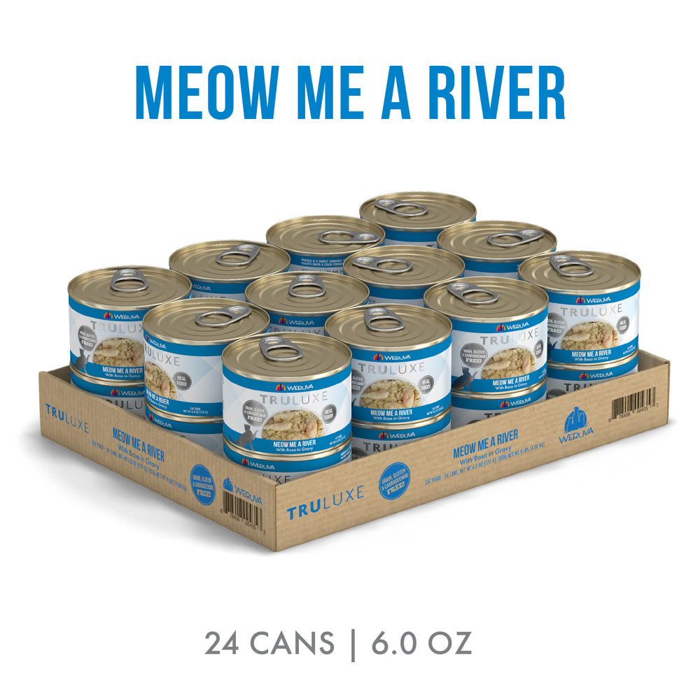 A cardboard tray holds 24 cans of TruLuxe Meow Me a River cat food (6.0 oz each), packaged in blue and white, with “Meow Me a River” above and “24 cans | 6.0 oz.” below.