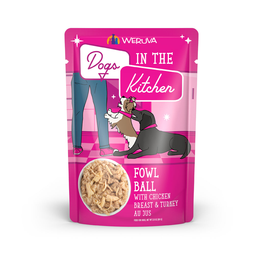 The Dogs in the Kitchen Fowl Ball pouch features cage-free shredded chicken and turkey in light broth, with a pink design showing two dogs by a person’s legs and a window to the high-protein recipe. Great for picky eaters.
