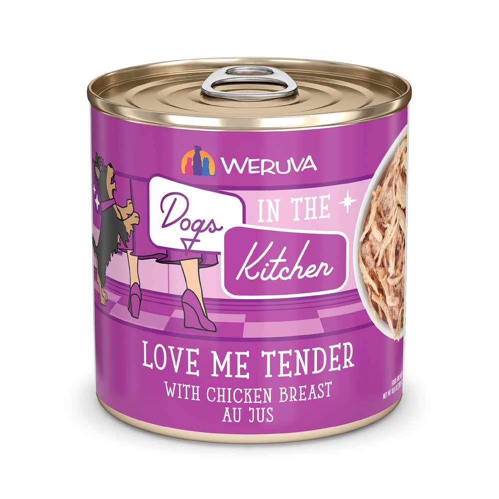 A can of Dogs in the Kitchen Love Me Tender dog food. The purple label shows dogs walking and shredded chicken breast au jus.