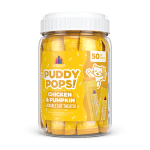 A clear plastic jar with a white lid holds Weruva Lickable Chicken & Pumpkin Cat Treats. The yellow label features a cartoon cat and states 50 hydrating treats inside, with individually wrapped packets visible in the jar.