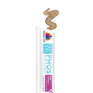 A tube labeled Weruva Wx Lickable Tuna Formula Cat Treat dispenses a swirl of brown, creamy, lower-phosphorus paste made with high-quality proteins from the top.