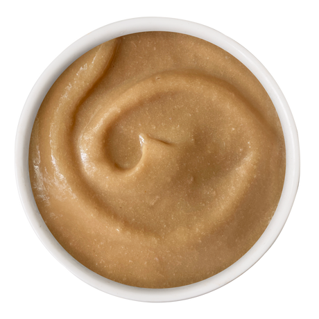 A bowl of creamy Chicken & Pumpkin Bisque with Senior Support from Cats in the Kitchen—shown from above with a smooth swirl—makes a tasty, nutritious treat for senior cats.