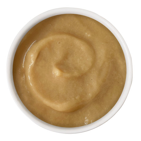 A white bowl filled with Cats in the Kitchen Salmon Bisque with Senior Support, viewed from above, showing a smooth and creamy texture reminiscent of a lickable bisque.