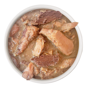 A white bowl filled with Cat Person Tuna & Salmon Shreds in Broth, featuring protein-rich seafood in savory broth, offers balanced nutrition for cats; viewed from above on a plain white background.
