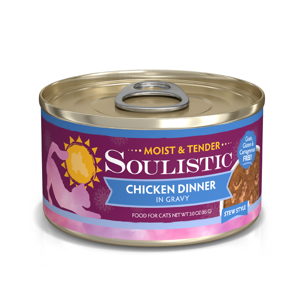 A can of Soulistic Chicken Dinner in Gravy cat food—stew style with high-quality minced deboned chicken, featuring a purple label with yellow sun logo and cat-person silhouette. Grain, gluten, and carrageenan free.