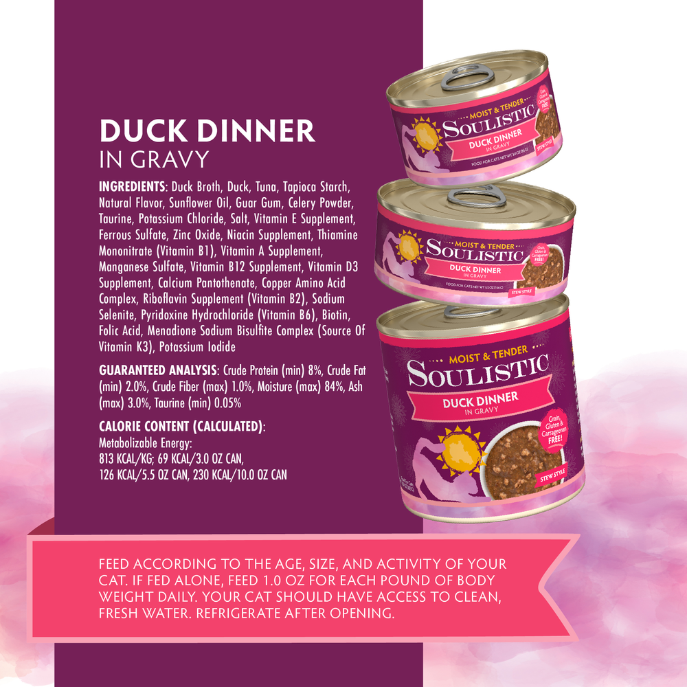 Three cans of Soulistic Duck Dinner in Gravy cat food are shown on a pink and white background, featuring deboned duck for high-quality protein. The packaging displays ingredients, nutritional info, and feeding instructions in a pink box.