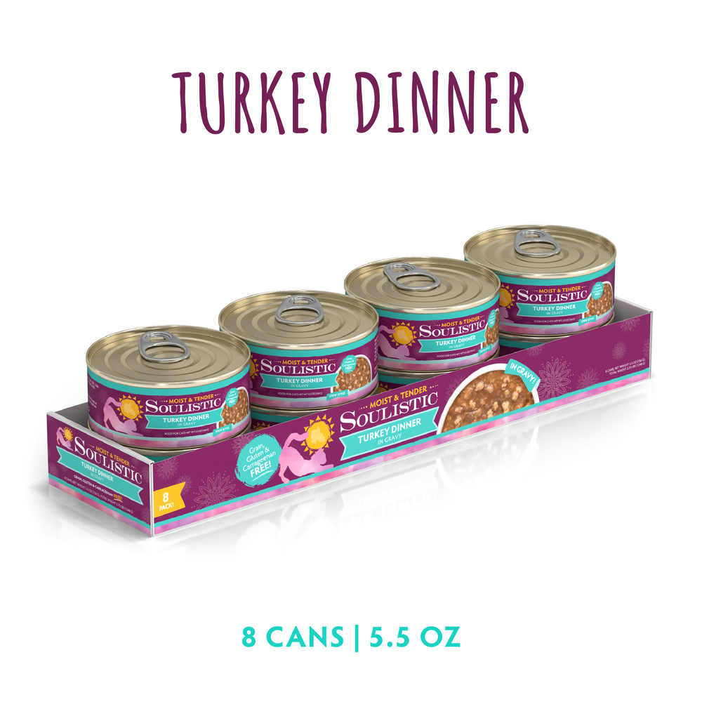 A purple tray displays eight 5.5 oz cans of Soulistic Turkey Dinner in Gravy cat food, featuring minced deboned turkey for quality protein, an image of turkey in gravy, and the text "8 cans | 5.5 oz" below.