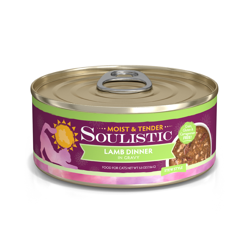 A can of Soulistic Lamb Dinner in Gravy cat food, stew style, features deboned lamb for high-quality protein. It's grain, gluten, and carrageenan free. The purple and gold label shows a cat silhouette with a sun graphic.