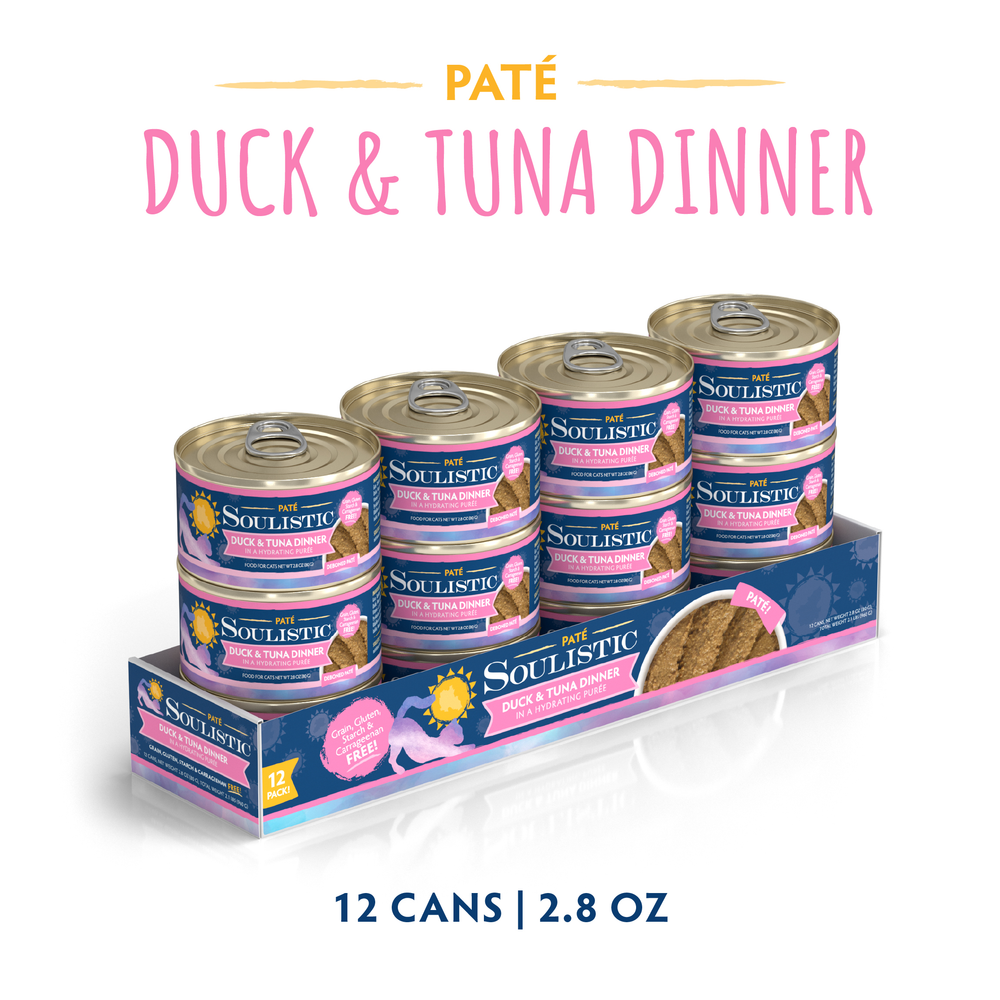 Twelve 2.8 oz cans of Soulistic Duck & Tuna Dinner in a Hydrating Purée are shown in a tray. Made with cage-free duck and wild-caught tuna, this grain, gluten & carrageenan free cat food comes in a 12-pack.