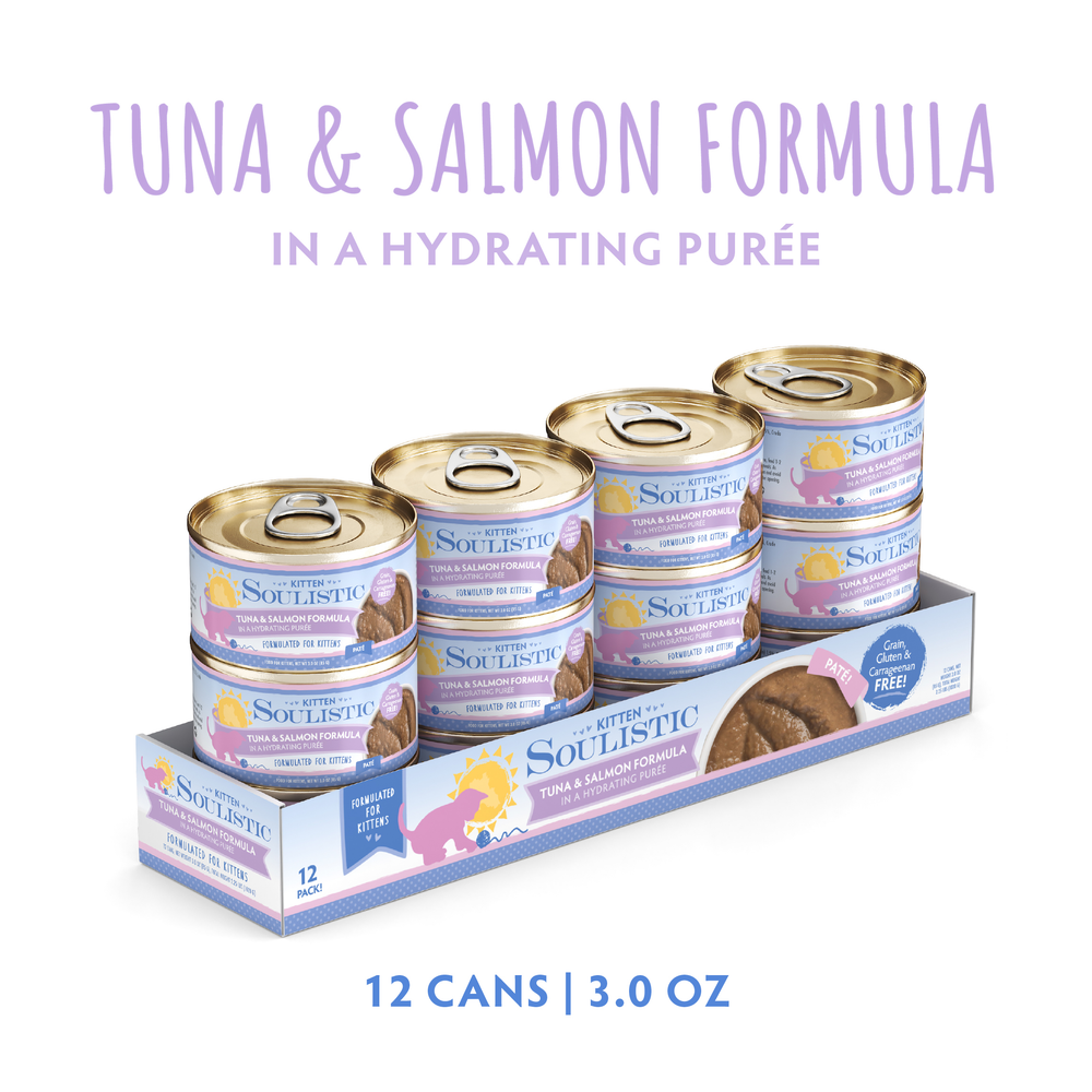 Five cans of Soulistic Tuna & Salmon Formula in Hydrating Purée are in a tray. Each 3.0 oz can features wild-caught tuna, with purple and white packaging showing cats and fish. Labels highlight grain-free, natural ingredients.