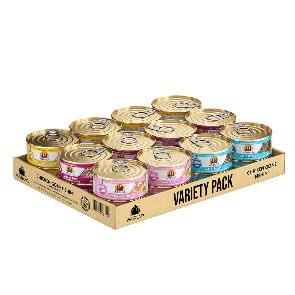 A cardboard tray labeled Variety Pack holds twelve cans of Weruva Chicken Gone Fishin' cat food, each with assorted pastel-colored labels, neatly arranged in three rows.