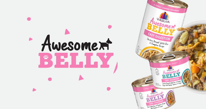 Three Weruva Awesome Belly pet food cans stacked on the right beside an open can showing stew, with the pink and black Awesome BELLY logo and pawprint on the left against a white background.