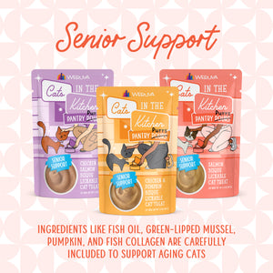 Three colorful pouches of Cats in the Kitchen’s Chicken & Pumpkin Bisque with Senior Support are shown, featuring cartoon cats and highlighting green-lipped mussel for aging cats. Beneficial ingredients are listed below.