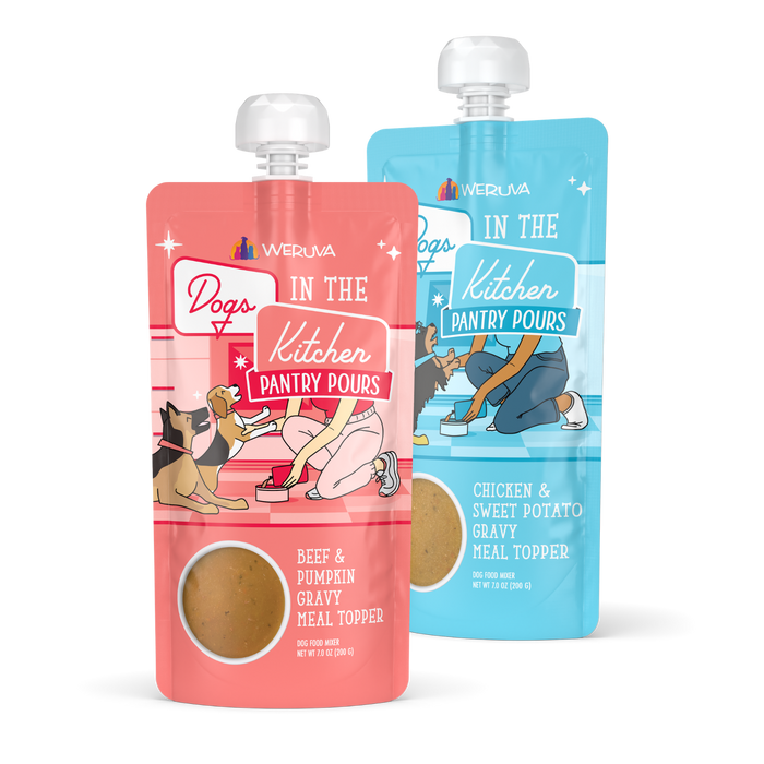 Two Weruva Dogs in the Kitchen Pantry Pours meal topper pouches, one beef & pumpkin flavor (pink) and one chicken & sweet potato flavor (blue), both featuring cartoon dogs and a person pouring food.